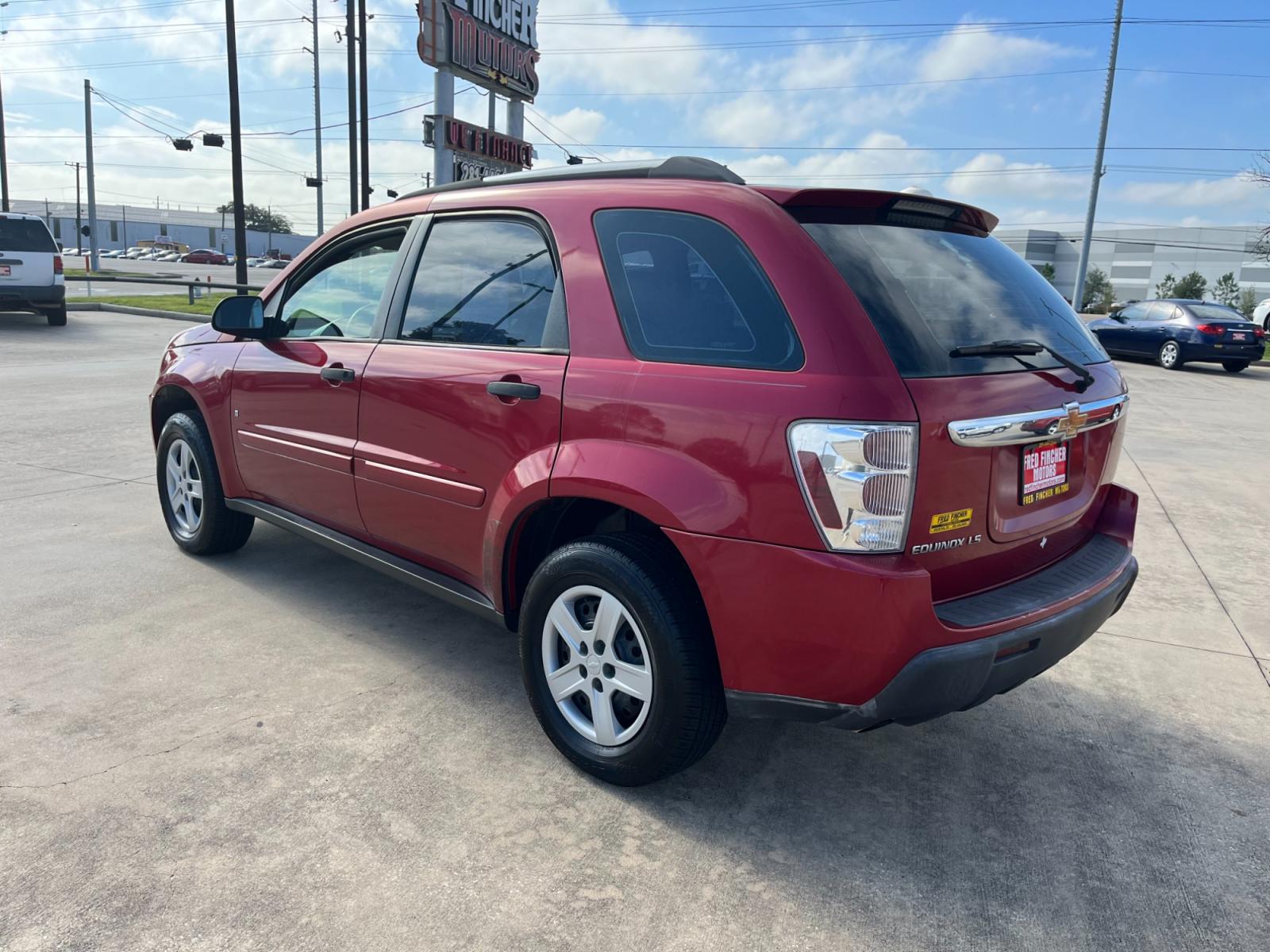 2006 red /TAN Chevrolet Equinox LS 2WD (2CNDL13F366) with an 3.4L V6 OHV 12V engine, 5-Speed Automatic transmission, located at 14700 Tomball Parkway 249, Houston, TX, 77086, (281) 444-2200, 29.928619, -95.504074 - Photo #4